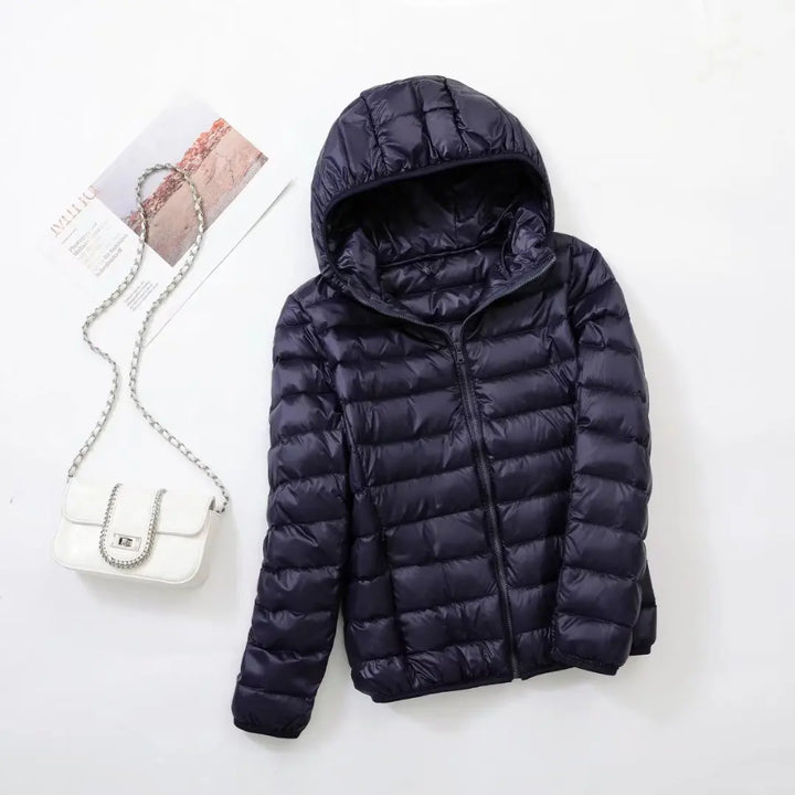 Hoymans dames donsjas met capuchon, warm & lichtgewicht, ideaal voor winter en herfst.