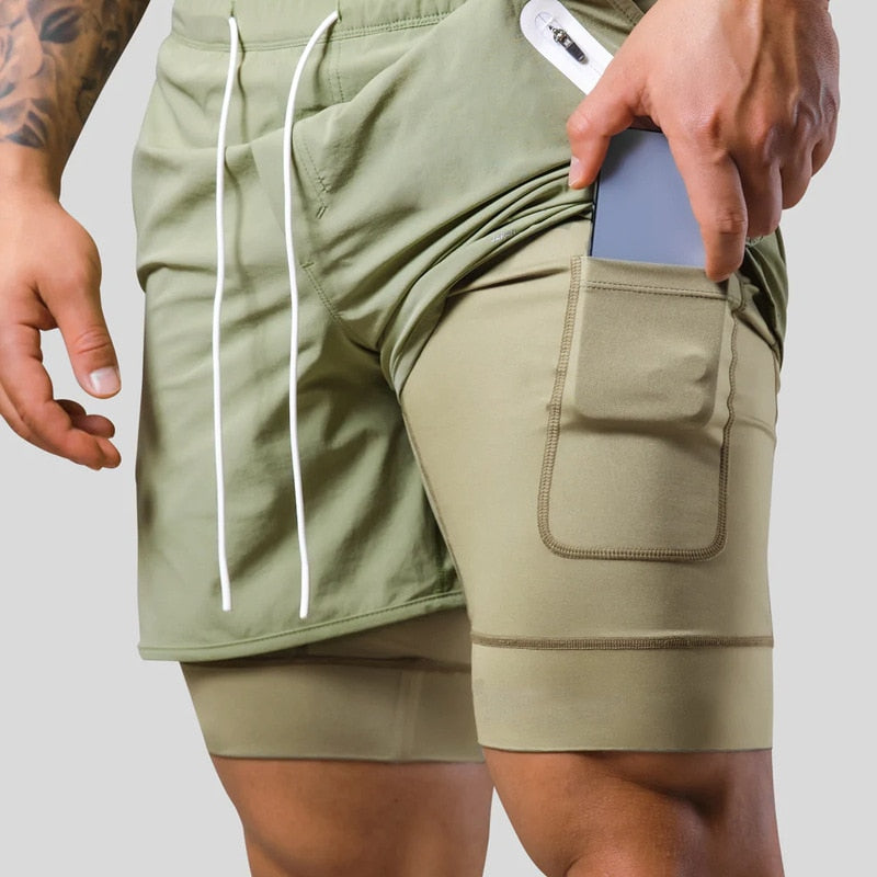 Zwarte heren trainingbroek, 2-in-1 model met geïntegreerde compressie voor optimale prestaties.
