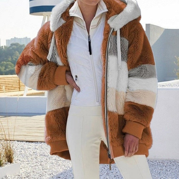 Comfortabel oversized damesvest in een trendy blokpatroon, ideaal voor de wintermaanden.