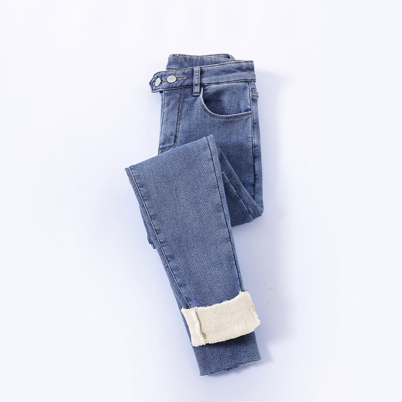 Vintage blauwe gevoerde winter thermobroek voor dames op lichte achtergrond