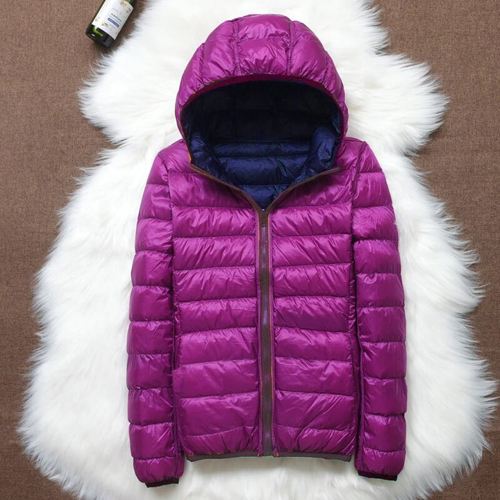 Warme Hoymans dames pufferjack met capuchon, donsjas, ideaal voor de winterkou.