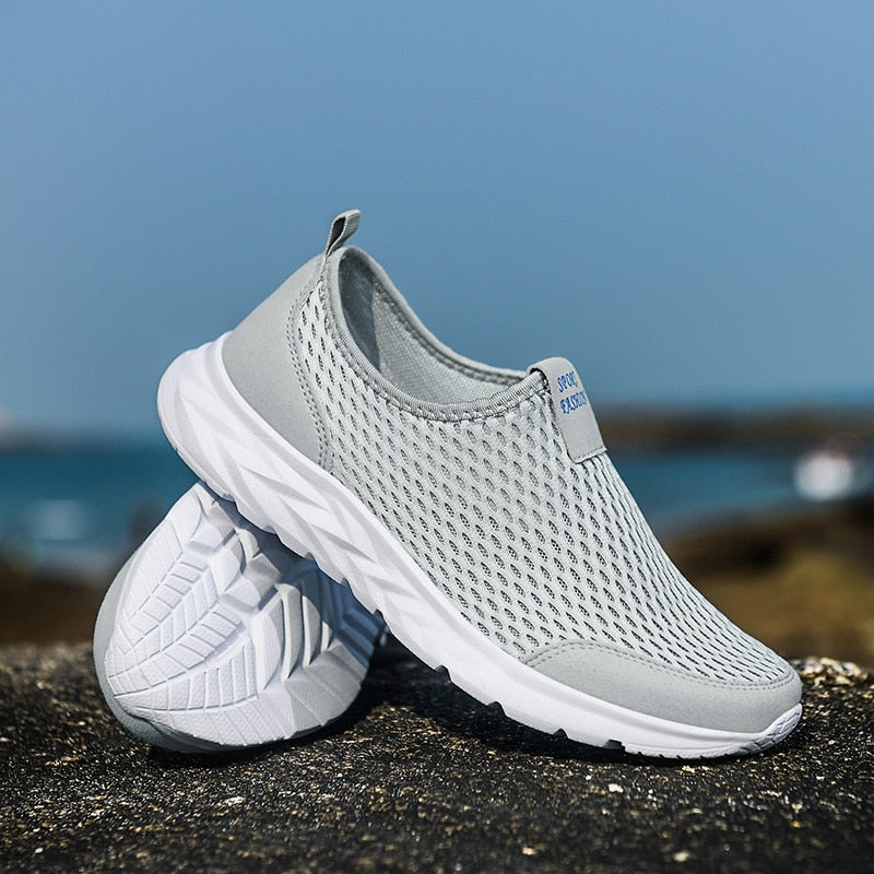 Grijze Ualy unisex sneakers met witte zool voor wandelen