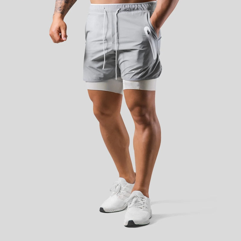 Heren sportbroek met elastische tailleband, 2-in-1 design voor maximaal comfort en ondersteuning.