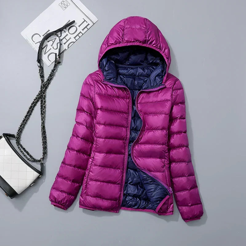 Functionele Hoymans donsjas met capuchon, dames, warm & licht, voor elk weerstype.