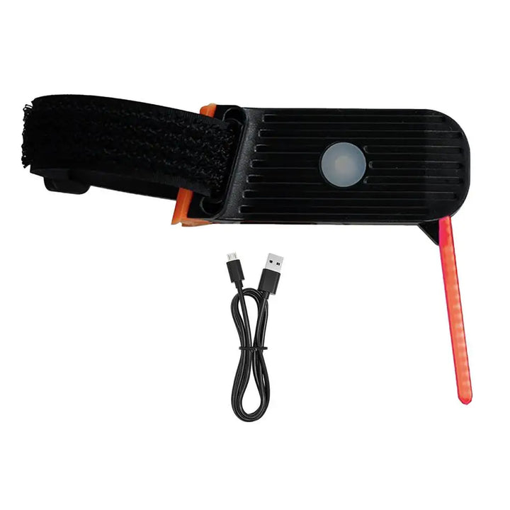 Veiligheidsverlichting voor de fiets: het Photon Drop achterlicht brandend getoond.