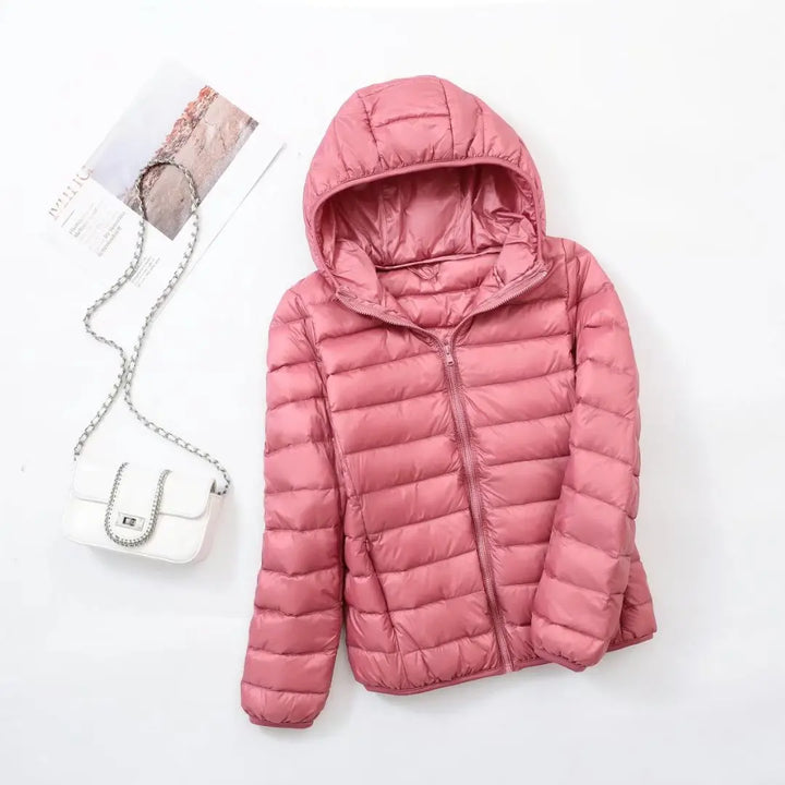 Comfortabele Hoymans dames donsjas met capuchon, warm en lichtgewicht, veelzijdig.