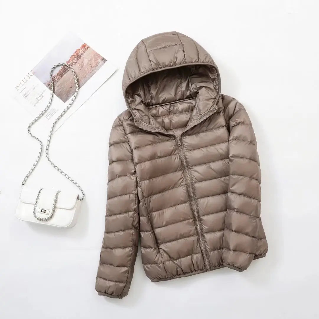 Hoymans lichte donsjas voor dames, capuchon, perfecte bovenkleding voor koud weer.