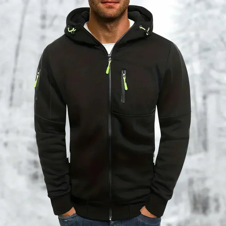 Detail van ritssluiting op MetroFlex herenhoodie; comfortabel sweatshirt en stijlvolle herenbovenkleding.