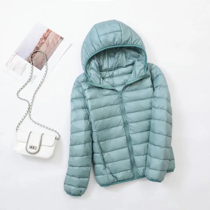 Warme dames winterjas van Hoymans, met capuchon, comfortabel en stijlvol design.