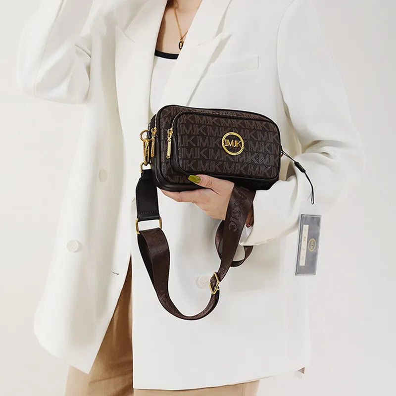 Elegante beige damesschoudertas met goudkleurige details