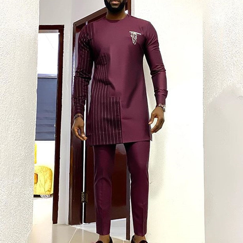 Comfortabele heren Dashiki set: traditioneel Afrikaans design met moderne slim fit broek. Veelzijdige heren outfit voor elke gelegenheid.