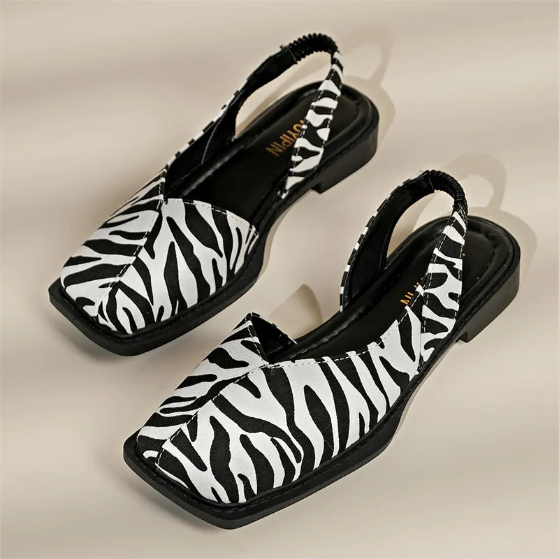 Stijlvolle dames slingback flats met vierkante neus, perfect voor een elegante zomerlook.
