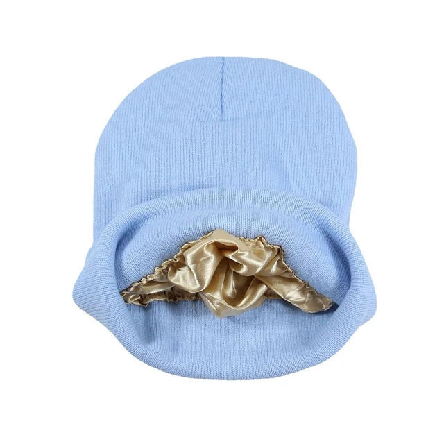 Zwarte dames wintermuts met satijn voering tegen kroeshaar