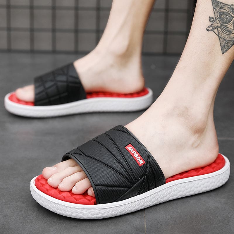Rode orthopedische instapslippers voor heren, combineert trendy stijl met therapeutisch comfort.