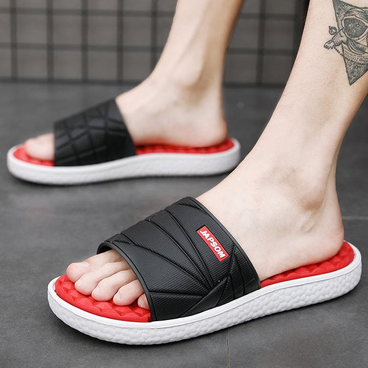 Rode orthopedische instapslippers voor heren, combineert trendy stijl met therapeutisch comfort.