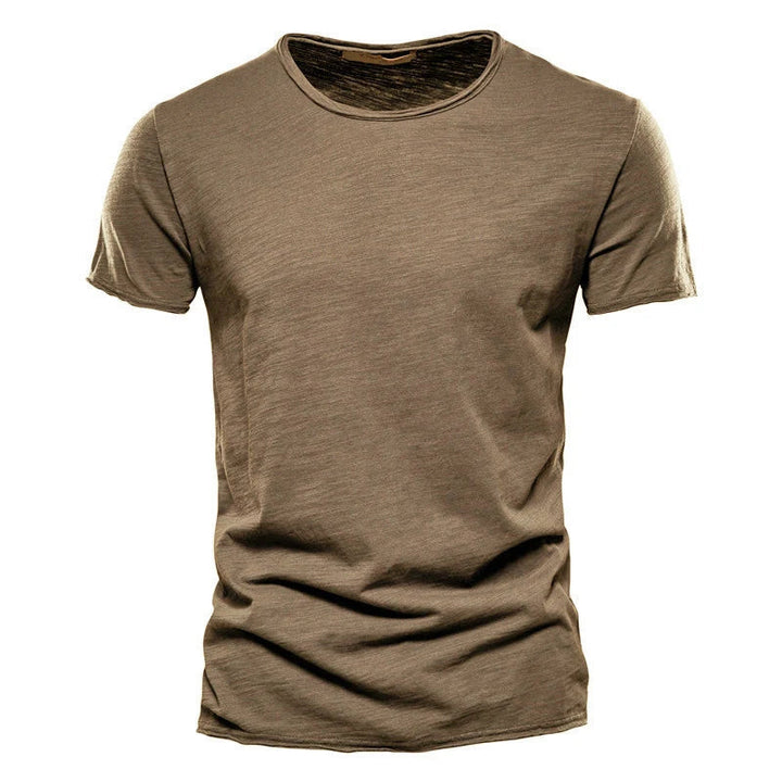 Roze heren T-shirt, subtiele tint, ronde hals, ontspannen pasvorm.