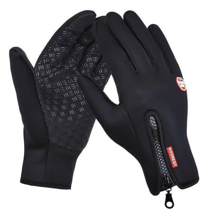 Detailopname van het waterdichte materiaal van de thermische unisex winterhandschoenen.