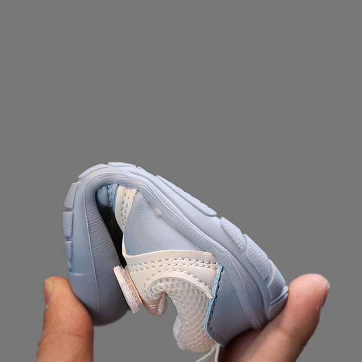 Barefoot babyschoenen met flexibele antislipzool, cruciaal voor stabiele eerste stapjes en natuurlijke ontwikkeling.