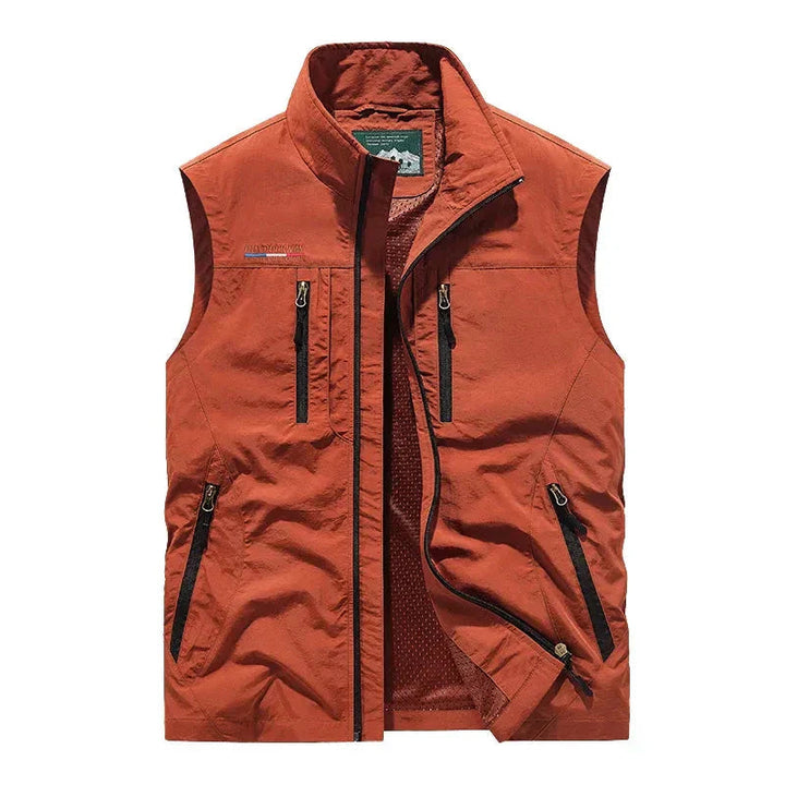 Oranje waterdichte heren bodywarmer met praktische opbergzakken