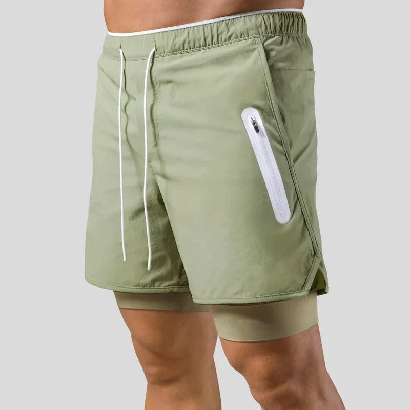 Veelzijdige heren actievekleding: 2-in-1 sportbroek voor fitness, hardlopen en dagelijkse training.