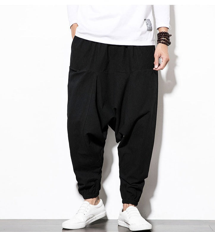 Harem model herenbroek, losse pasvorm, ideaal voor streetwear en comfort.