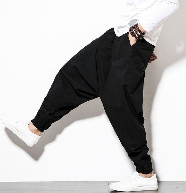 Donkere heren harem trainingsbroek, veelzijdige keuze voor dagelijkse streetwear.