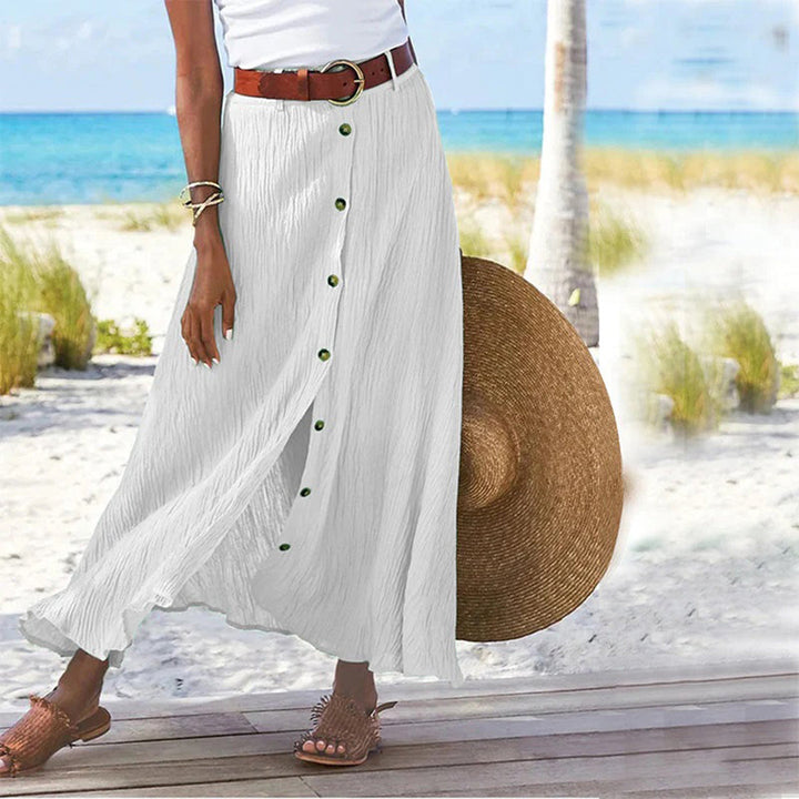 "A-lijn maxi-rok van zomers katoen, witte kleur, met elastische taille en asymmetrische zoom, elegant en comfortabel"