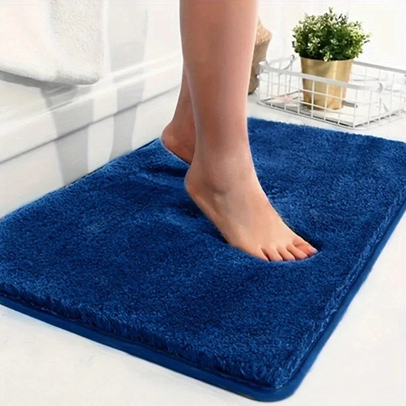 "Absorberende antislip badmat met geometrisch patroon, zacht gevoerd, ideaal voor moderne badkamer."