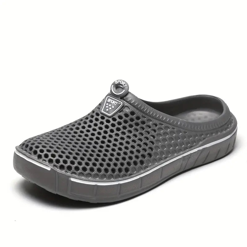 "Ademende herenclogs in sportieve stijl, lichtgewicht en flexibel, ideaal voor actieve dagen en vrije tijd."