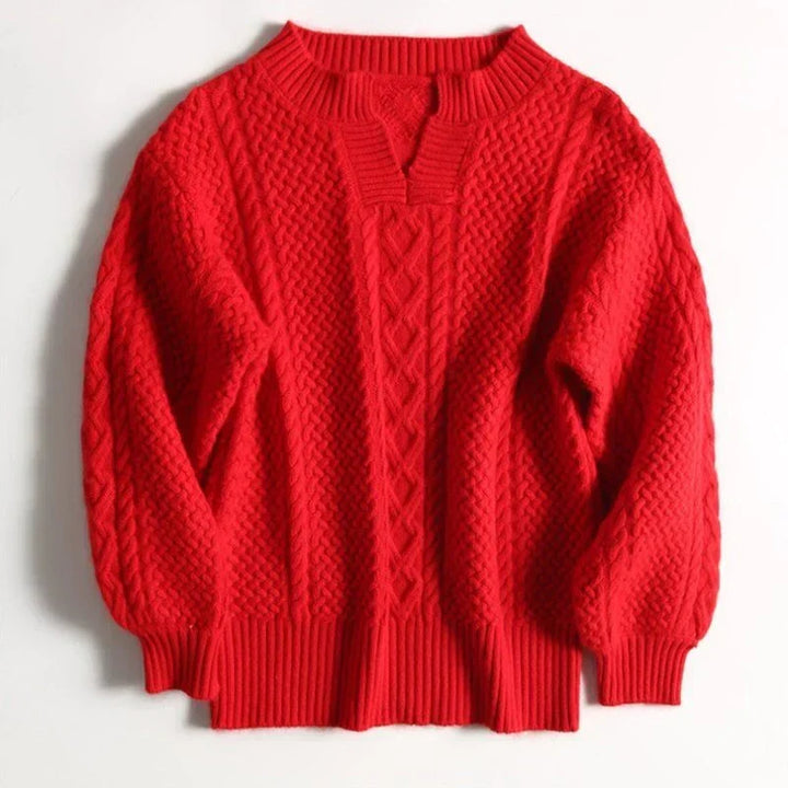 "Ademende wollen trui met uniek kabelpatroon, stijlvolle winterkleding voor dames, verkrijgbaar in diverse kleuren."