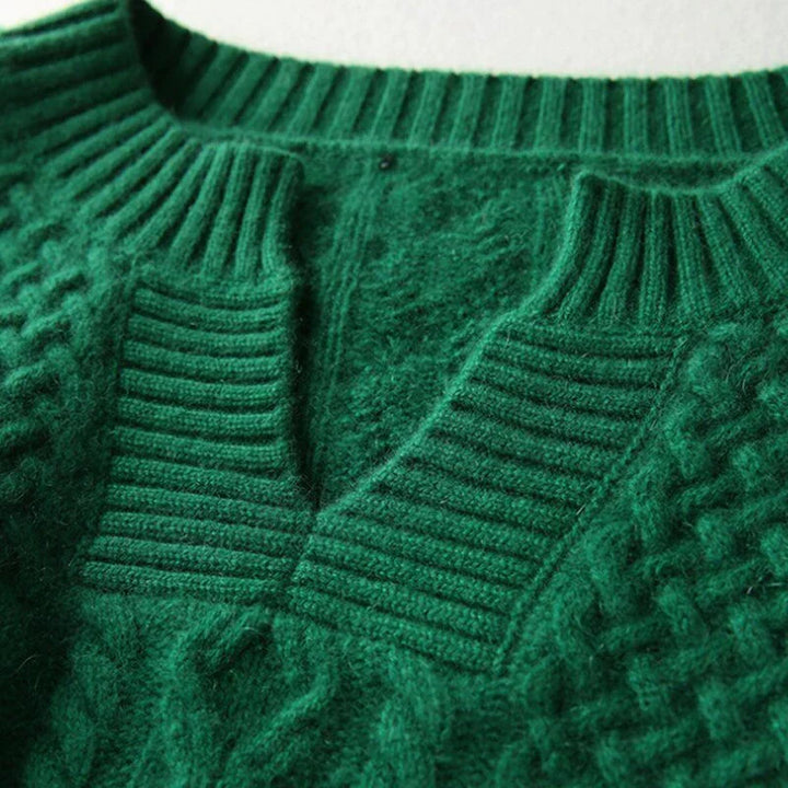 "Ademende wollen trui met uniek kabelpatroon, stijlvolle winterkleding voor dames, verkrijgbaar in diverse kleuren."