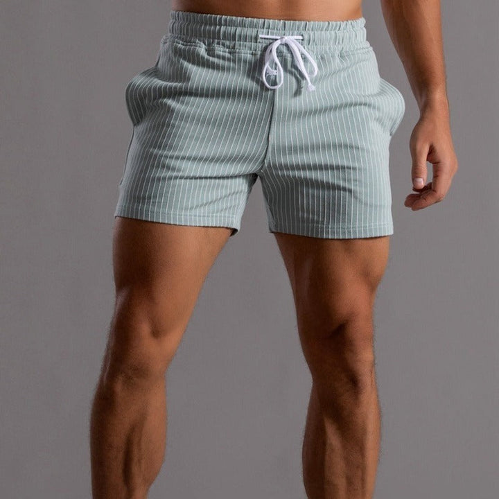 Ademende stof en zakkendetail van de heren sportkleding zomerkleding
