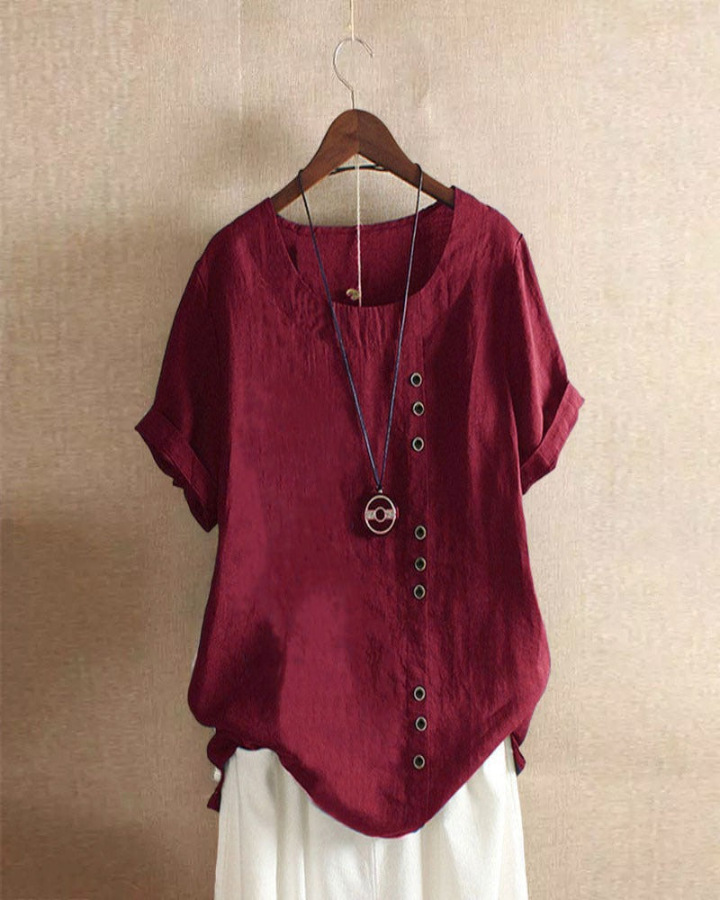 "Asymmetrische linnen blouse met moderne knopen, lichtgroen, ideaal voor casual en chique gelegenheden, stijlvolle look."