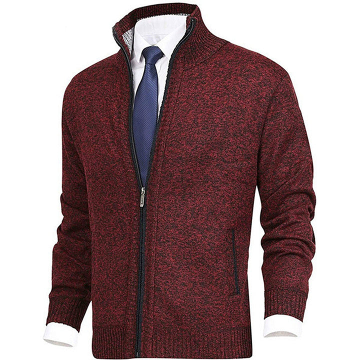 "Blauw herenvest van hoogwaardige fleece met rits en hoge kraag, perfect voor lente. Warm en veelzijdig ontwerp."