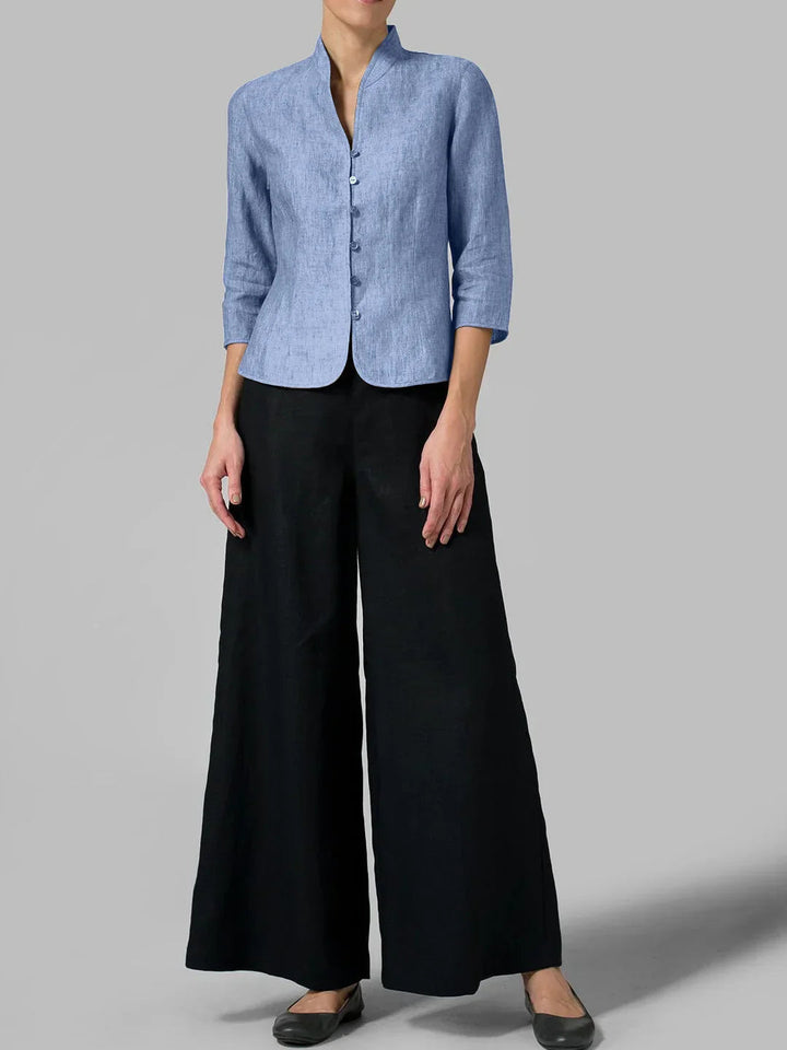 "Carmencita damesblouse, elegante hoge kraag, getailleerde pasvorm, zachte stof, geschikt voor zakelijke en casual looks."