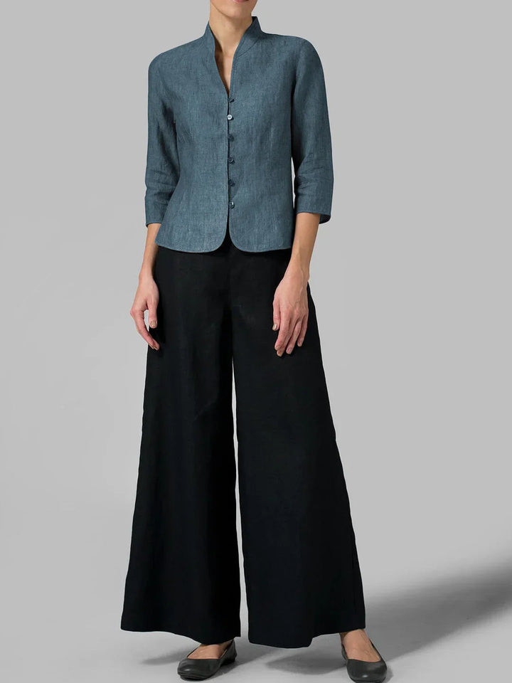 "Carmencita damesblouse, elegante hoge kraag, getailleerde pasvorm, zachte stof, geschikt voor zakelijke en casual looks."