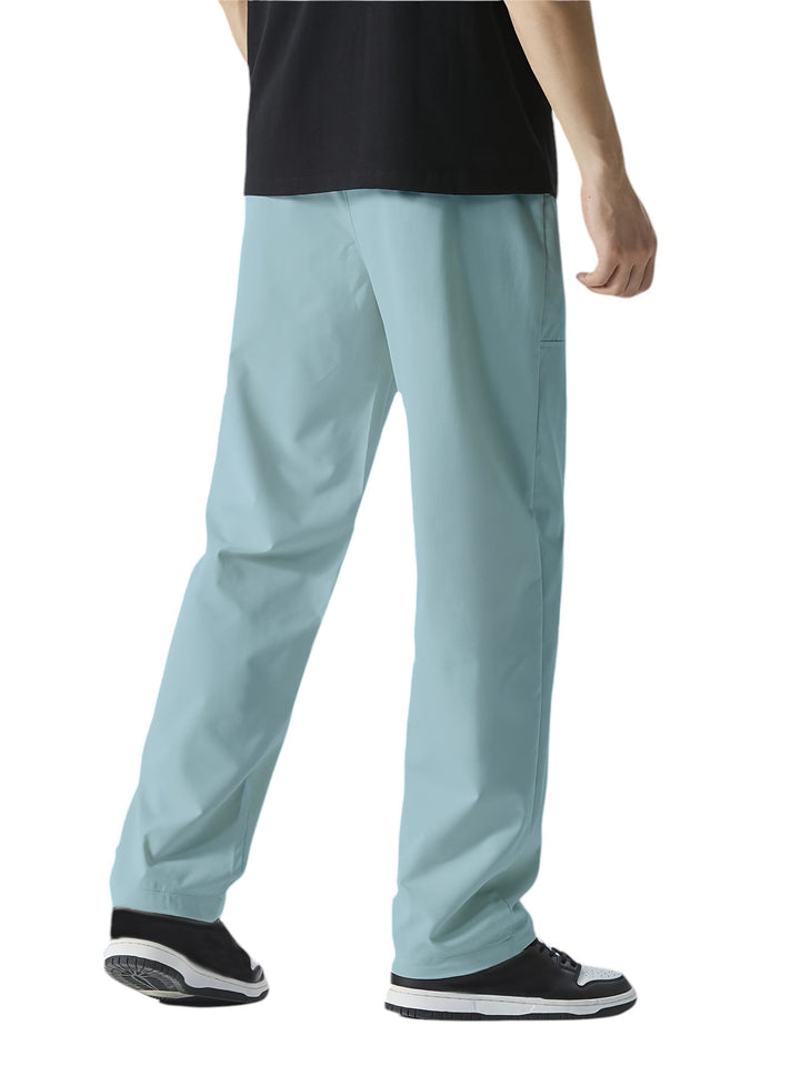 "Casual chique heren joggingbroek, donkergrijs, ademende stof, elastische tailleband met trekkoord, comfortabele pasvorm."