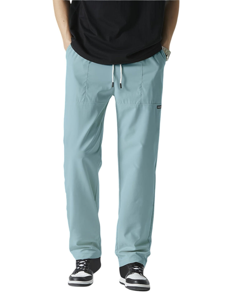"Casual chique heren joggingbroek, donkergrijs, ademende stof, elastische tailleband met trekkoord, comfortabele pasvorm."
