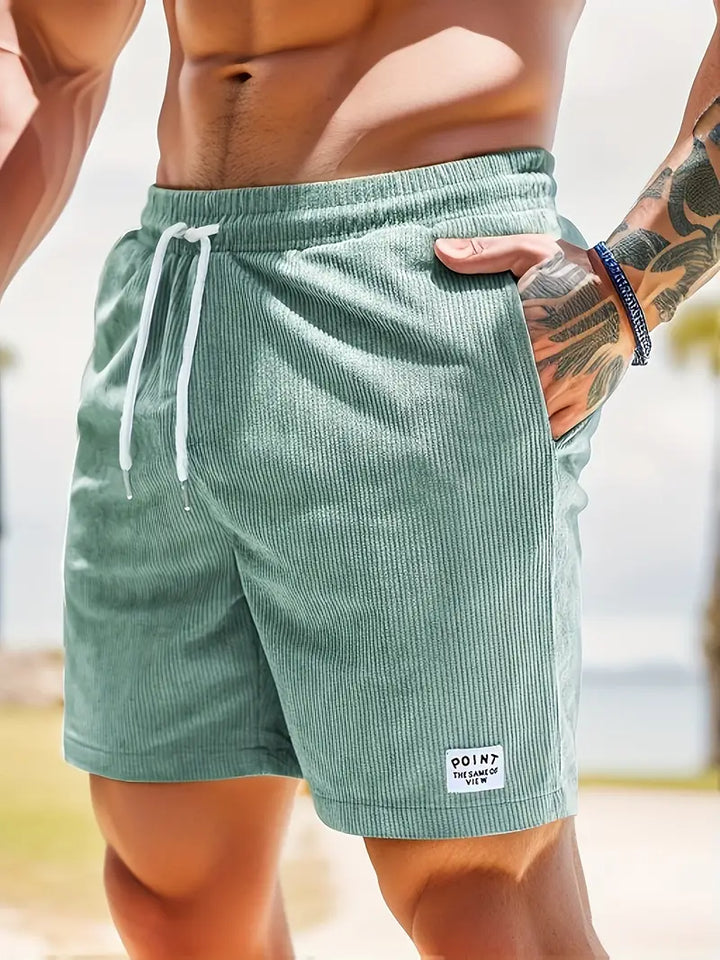 "Casual heren zwembroek met elastische taille en trendy design, ideaal voor strand en zwembad."