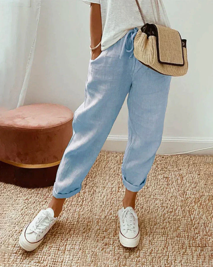 "Casual linnen broek voor dames, comfortabel en stijlvol, beige kleur, flatterend silhouet voor elke gelegenheid."