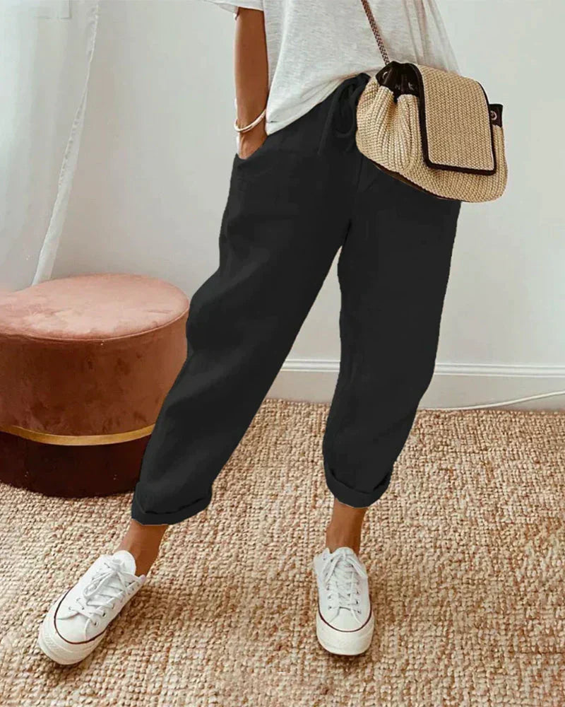 "Casual linnen broek voor dames, comfortabel en stijlvol, beige kleur, flatterend silhouet voor elke gelegenheid."