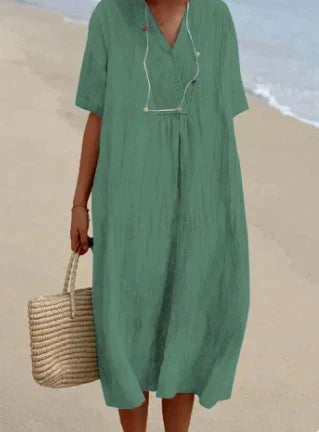 Luchtige casual midi strandjurk voor dames. Ideaal voor warme zomerdagen, comfortabel en modieus.