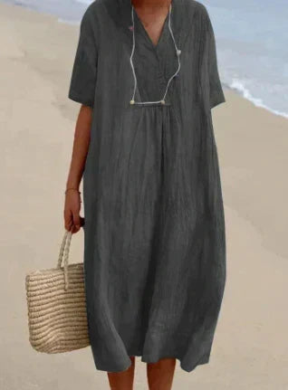Comfortabele dames midi jurk met korte mouwen. Zachte stof, ademend en perfect voor zomerse ontspanning.