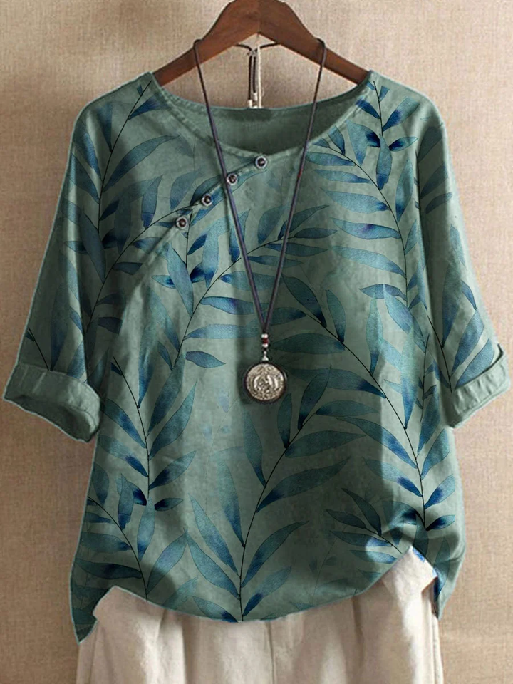 "Casual zomerlinnen overhemd in wit, licht en ademend, ideale damesblouse voor warme dagen met losse pasvorm."
