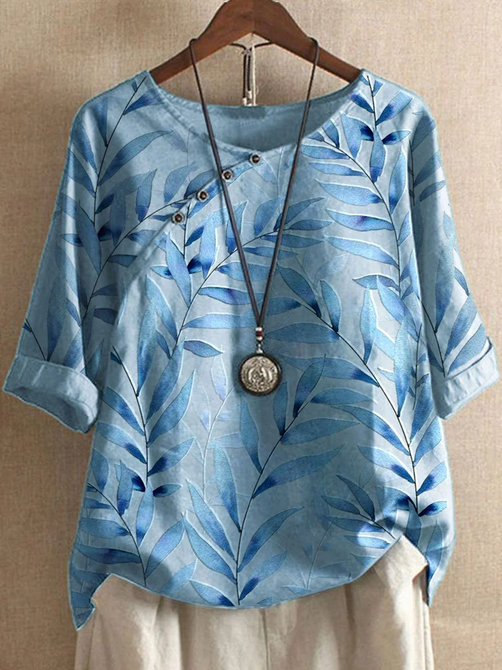 "Casual zomerlinnen overhemd in wit, licht en ademend, ideale damesblouse voor warme dagen met losse pasvorm."