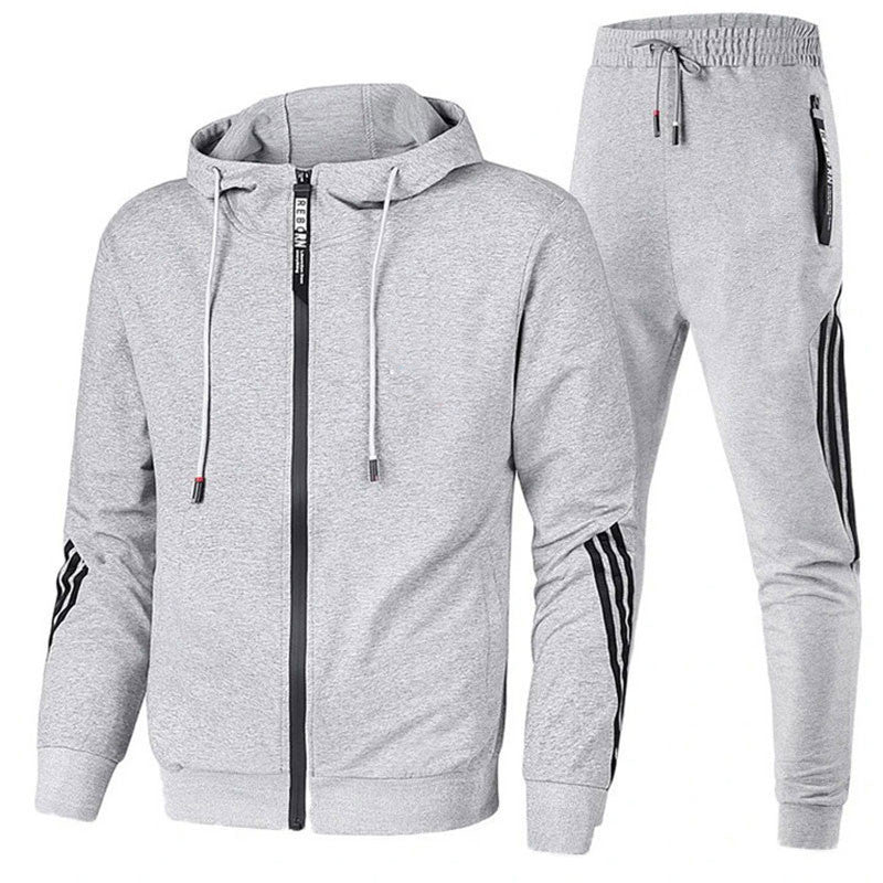 Herenkleding: sportief trainingspak met strakke pasvorm, comfort voor dagelijks gebruik en vrije tijd.