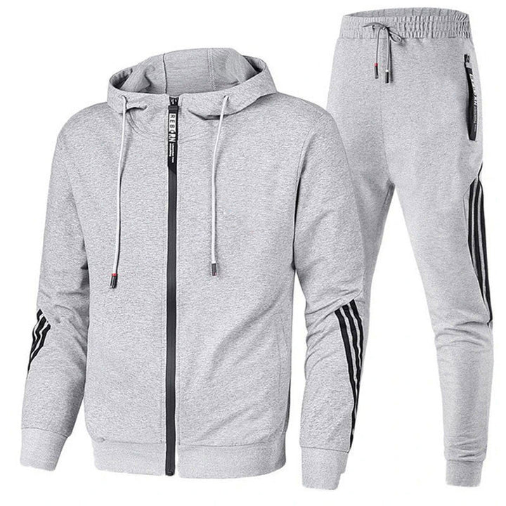 Herenkleding: sportief trainingspak met strakke pasvorm, comfort voor dagelijks gebruik en vrije tijd.