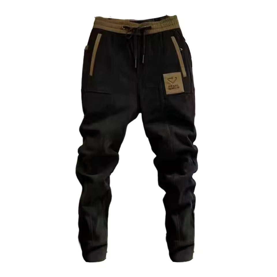 Casual heren corduroy joggingbroek, taps model met cargo zakken, perfect voor alle seizoenen. Zwart/grijs.