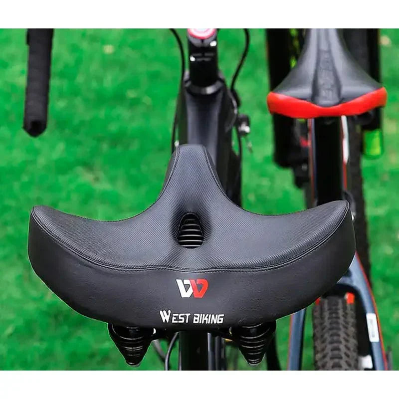 "Comfortabel fietszadel met extra brede zitting, ergonomisch design, ademende bekleding, schokabsorberend schuim."