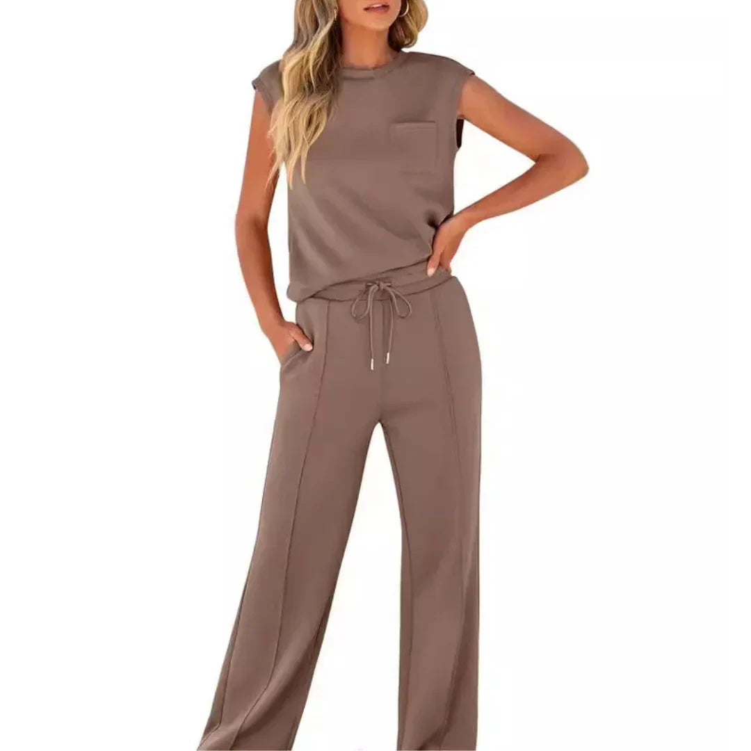 Tweedelige dames loungewear set: elegante mouwloze top met ronde hals en wijde broek met trekkoord.